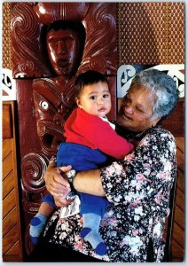 Postcard - Grandmother with baby in meeting house, Waiwhetu Marae - New Zealand