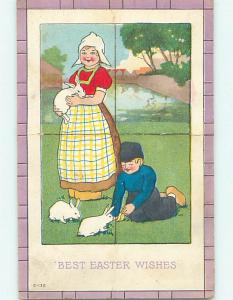 Bent 1921 Easter GIRL HOLDS BUNNY RABBIT WHILE BOY FEEDS THEM o6166