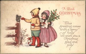 Christmas Children Feed Squirrel Holly Poem c1900s-10s Postcard