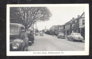 MCSHERRYSTOWN PENNSYLVANIA DOWNTOWN MAIN STREET OLD CARS VINTAGE POSTCARD