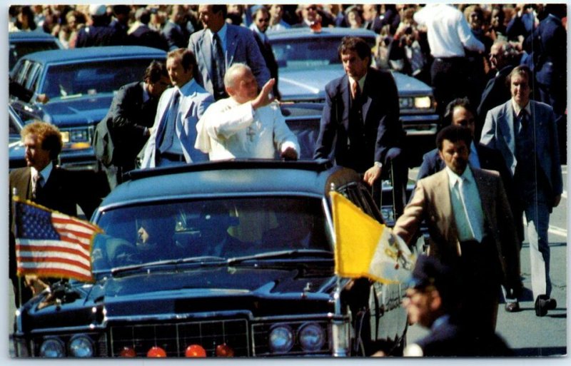M-77215 Pope John Paul II makes his way through the streets of Washington D C