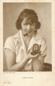 Film and stage stars history beauty actress Liane Heid with cherries