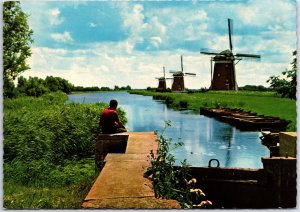 CONTINENTAL SIZE POSTCARD ROW OF DUTCH WINDMILLS AT KINDERDIJK HOLLAND