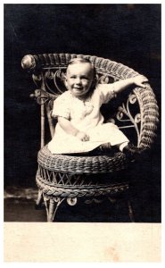 Happy Baby on Wicker Chair