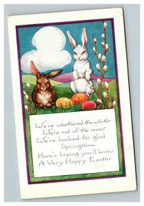 Vintage 1910's Whitney Easter Postcard Cute Bunnies Colored Eggs Puffy Clouds