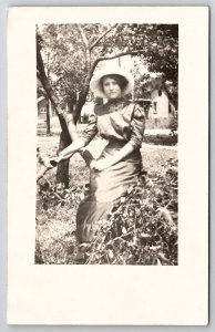 RPPC Pretty Young Lady Posing On Tree Branch Real Photo c1910 Postcard P25
