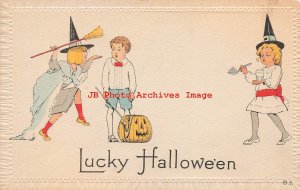 344539-Halloween, Nash No 8A-1, 2 Girls Dressed as Witches Approach Boy with JOL