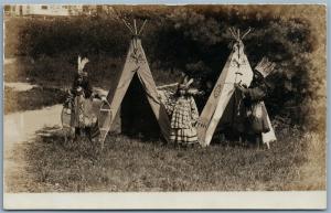 INDIAN KIDS AT WIGWAMS ANTIQUE REAL PHOTO POSTCARD RPPC