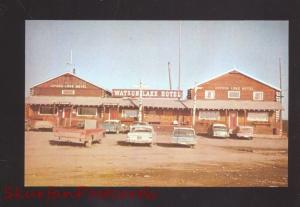 WATSON LAKE HOTEL YUKON TERRITORY CANADA OLD CARS ADVERTISING POSTCARD