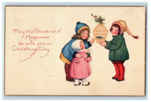 1921 Christmas Day Girl With Present Gift Bird For Little Girl Vintage Postcard