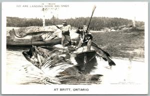 BRITT ONT. CANADA FISHING EXAGGERATED VINTAGE REAL PHOTO POSTCARD RPPC