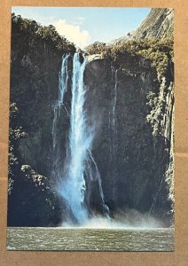 UNUSED POSTCARD - AERIAL VIEW OF THE SOUND, MILFORD SOUND, NEW ZEALAND