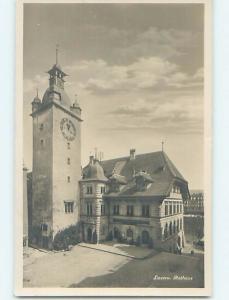 old rppc CLOCK TOWER BESIDE BUILDING Lucerne - Luzern Switzerland HM1517