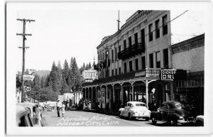 RPPC NEVADA CITY, CA Street Scene NATIONAL HOTEL Drug Store 40s Vintage Postcard