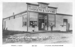J32/ Monument Colorado RPPC Postcard c1960s Caskets Coffins Store 50