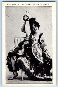 Risque Humor Postcard Gymnastic Girl Holding Up The First Natural Bank c1910's