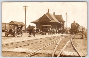 Chesaning~Michigan Central MC Railroad Depot~Train~Dog on Auto~Crowd~1913 RPPC 