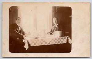 RPPC Men at Kitchen Table Pitcher Large Block Cheese c1907 Postcard D21