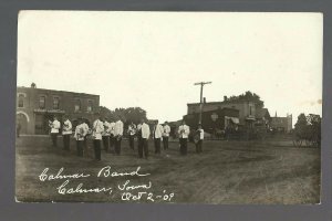 Calmar IOWA RPPC 1909 BAND PARADE Main Street nr Decorah Cresco Fort Atkinson
