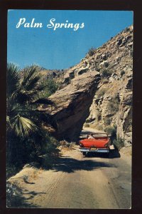 Palm Springs, California/CA Postcard, Red Chevrolet Convertible Thru Split Rock