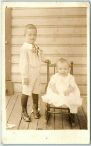 M-32202 Photo of a little boy and his baby brother smiling