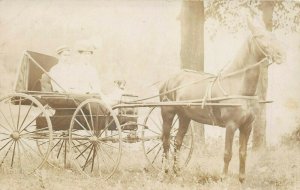 1910s RPPC Real Photo Postcard Horse And Buggy Man Woman Dog