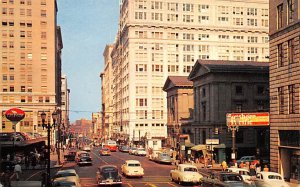 a street scene showing a portion of the thriving city of the Pacific Northwes...