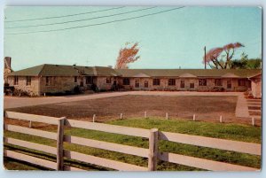 Boone Iowa IA Postcard Topper Motel Exterior Roadside Fence Scene c1960s Vintage