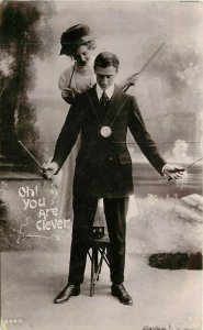 RPPC Postcard 3448. Oh! You Are Clever, Woman & Man Playing Diabolo Together