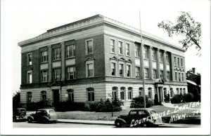 RPPC Court House - Carlton, MN Minnesota Street View Cars UNP Postcard