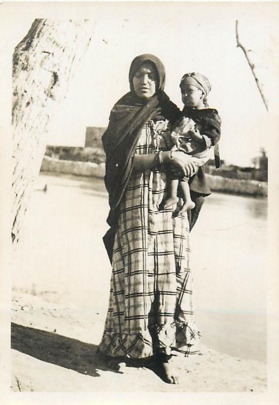 Real photo ethnic arab woman with child