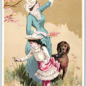 c1880s Cute Mother & Daughter & Dog Pick Flowers Domestic Sewing Trade Card C34