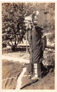 D32/ Wisconsin Dells Wi Postcard RPPC c30s Chief Walking Daylight Native Indian