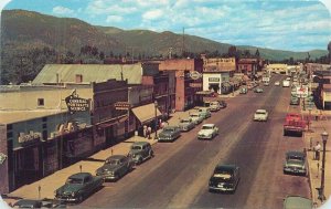 Idaho Sandpoint 1st Avenue autos 1950s Hall Dexter roadside Postcard 22-9656