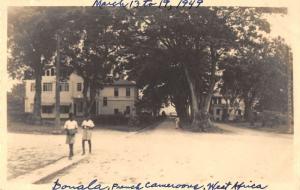 Donala French Camaroons West Africa pedestrians homes real photo pc Y11990