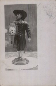 German or Austrian Decorative Statue of Man Clock & Chimes Real Photo Postcard