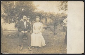 Man & Woman Sitting on Chairs Outside RPPC Unused c1920s