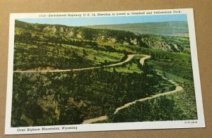 VINTAGE UNUSED .01 LINEN POSTCARD SWITCHBACK HWY U.S.14 OVER BIGHORN MTNS, WYO.