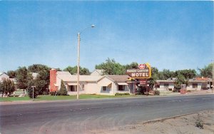 J26/ Yuma Colorado Postcard Chrome Bronze Lantern Motel Bushner  319