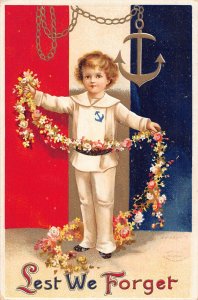 US Patriotic Ellen Clapsaddle Art Lest we forget Sailor embossed postcard B986