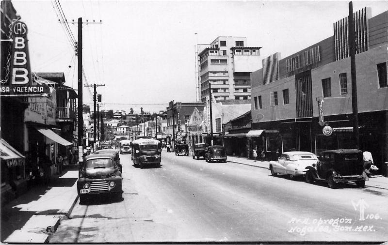 #106. Av. Obregon Nogales Mexico Real Photo Postcard. Signs Old Cars 