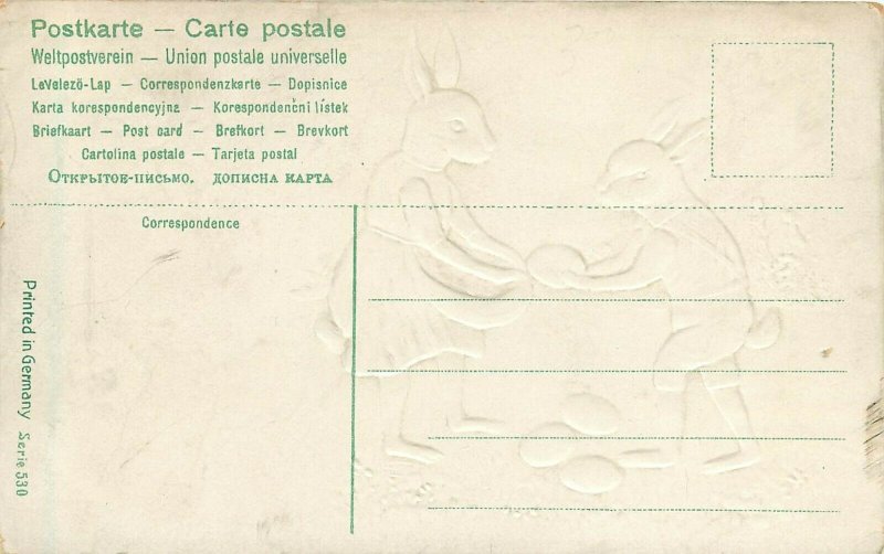 Embossed Easter Postcard Ser.530 Blue Ink Dressed Rabbits gathering Gold Eggs