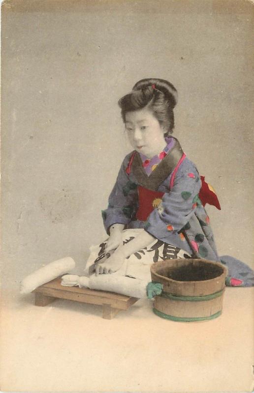 c1910 Hand-colored Postcard; Kneeling Japanese Woman Cuts Daikon Radish w Knife