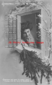 Christmas, EAS RPPC, Pretty Woman Sitting in the Window Sill