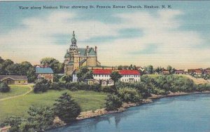 New Hampshire Nashua View along Nashua River Showing Saint Francis Xavier Church