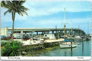 VINTAGE CONTINENTAL SIZE POSTCARD RIVIERA BRIDGE AND BLUE HERON MARINA FLORIDA