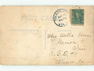 Pre-1920 rppc WOMAN CHOPS WOOD Postmarked Toledo Ohio OH i7191