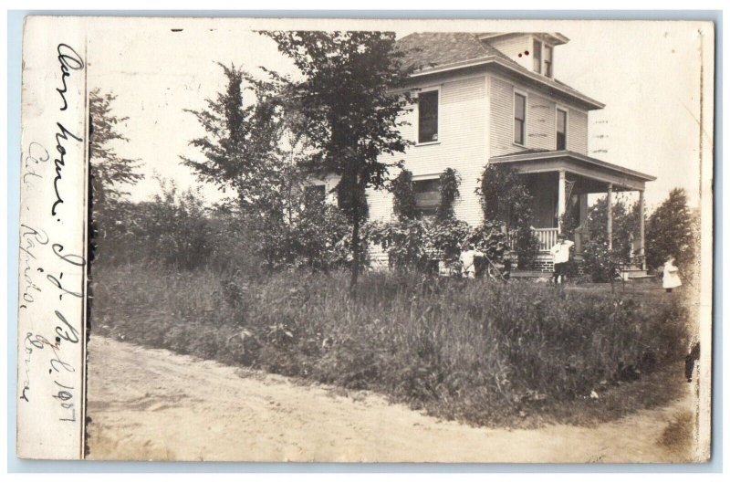 1907 House Scene Child Dirt Road Cedar Rapids Iowa IA RPPC Photo Postcard