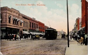 Main Street Sheridan WY Wyoming Streetcar Yellow Automobile Postcard H59 *as is