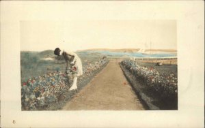 Wellfleet MA Written on Back Woman Picking Flowers Cape Cod c1930 RPPC Postcard